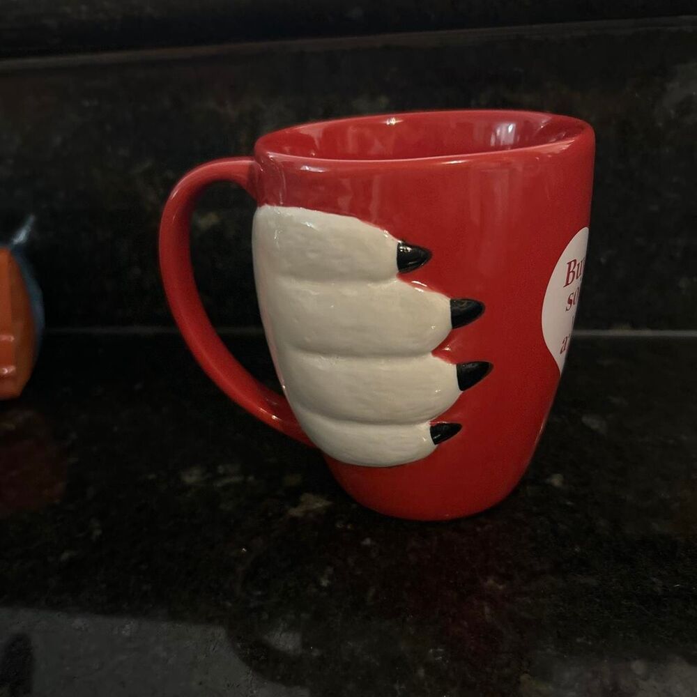Coca-Cola red mug with white heart graphic'Buy someone you love a Coke